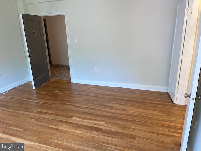 3051 Idaho Avenue Northwest, Unit 417 Washington, DC 20016 - Photo 3 of 13 Living area to closet/bath