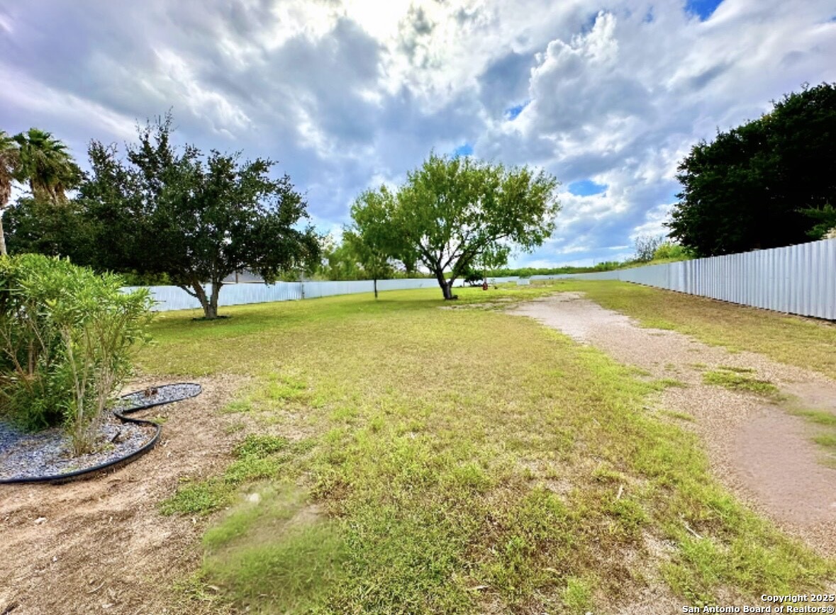 7605 North Doolittle Road Edinburg, TX 78542 - Photo 2 of 6 a view of an outdoor space and swimming pool