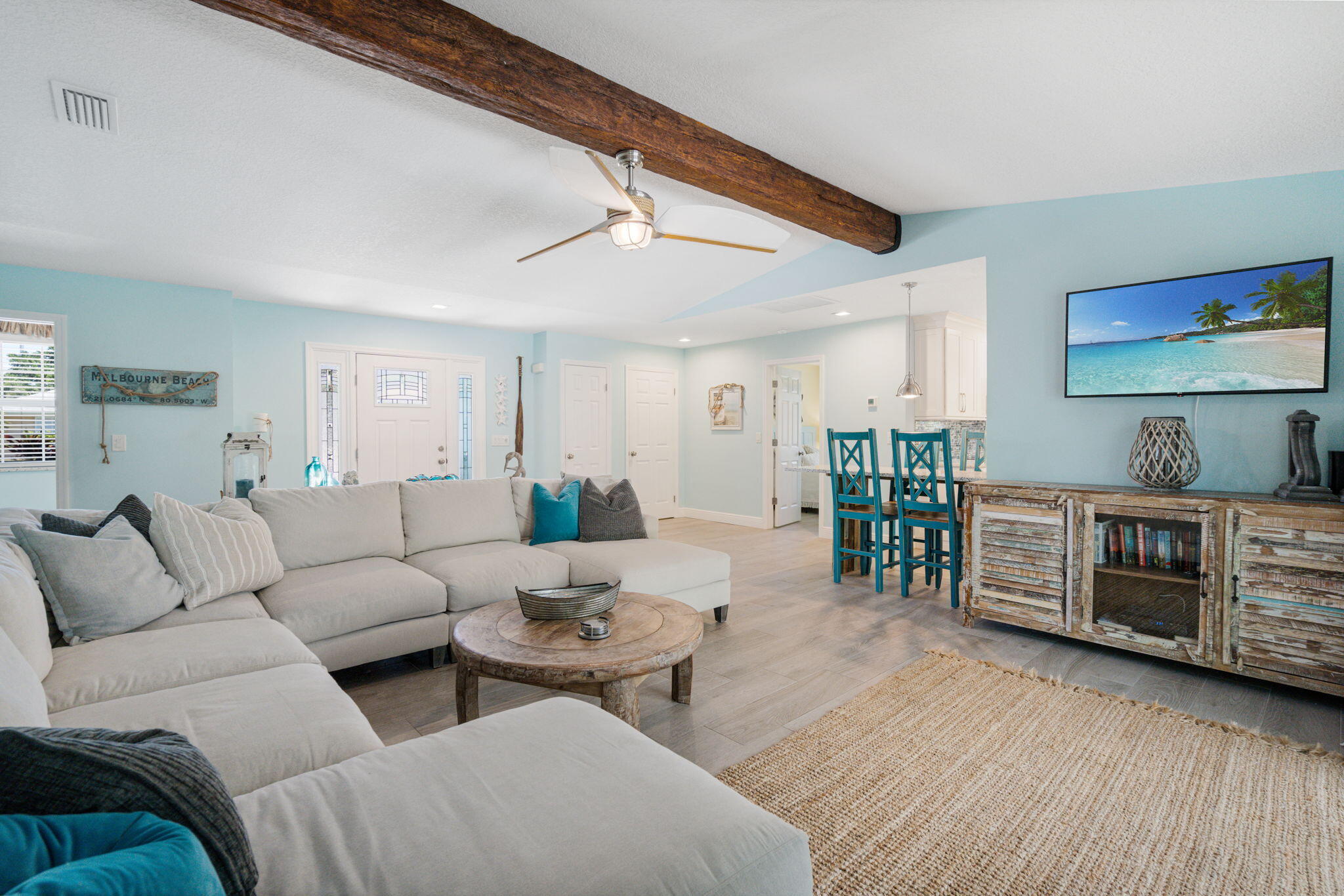 401 Surf Road Melbourne Beach, FL 32951 - Photo 15 of 94 a living room with furniture and wooden floor