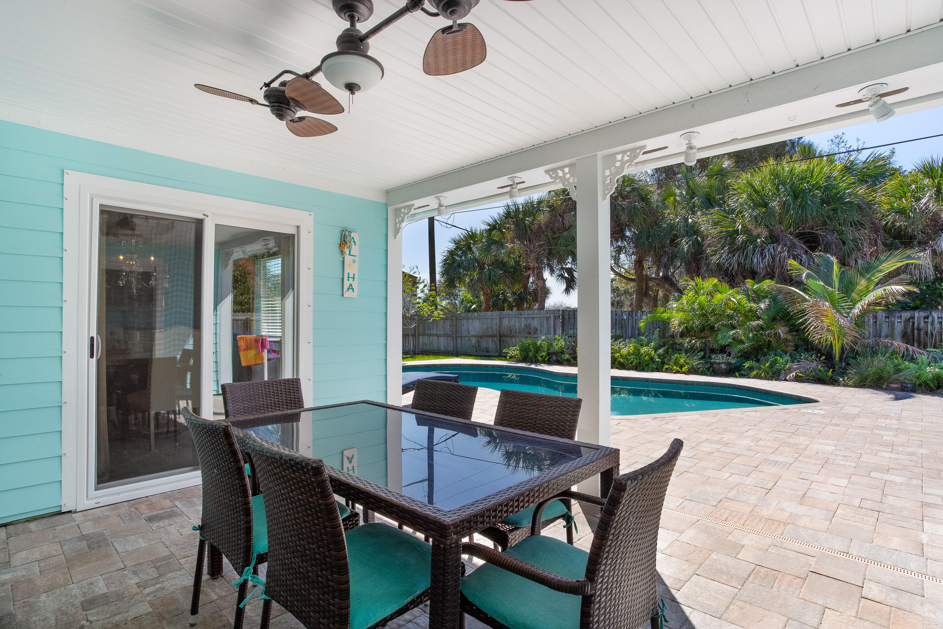 401 Surf Road Melbourne Beach, FL 32951 - Photo 58 of 94 a view of a dining room with furniture window and outside view