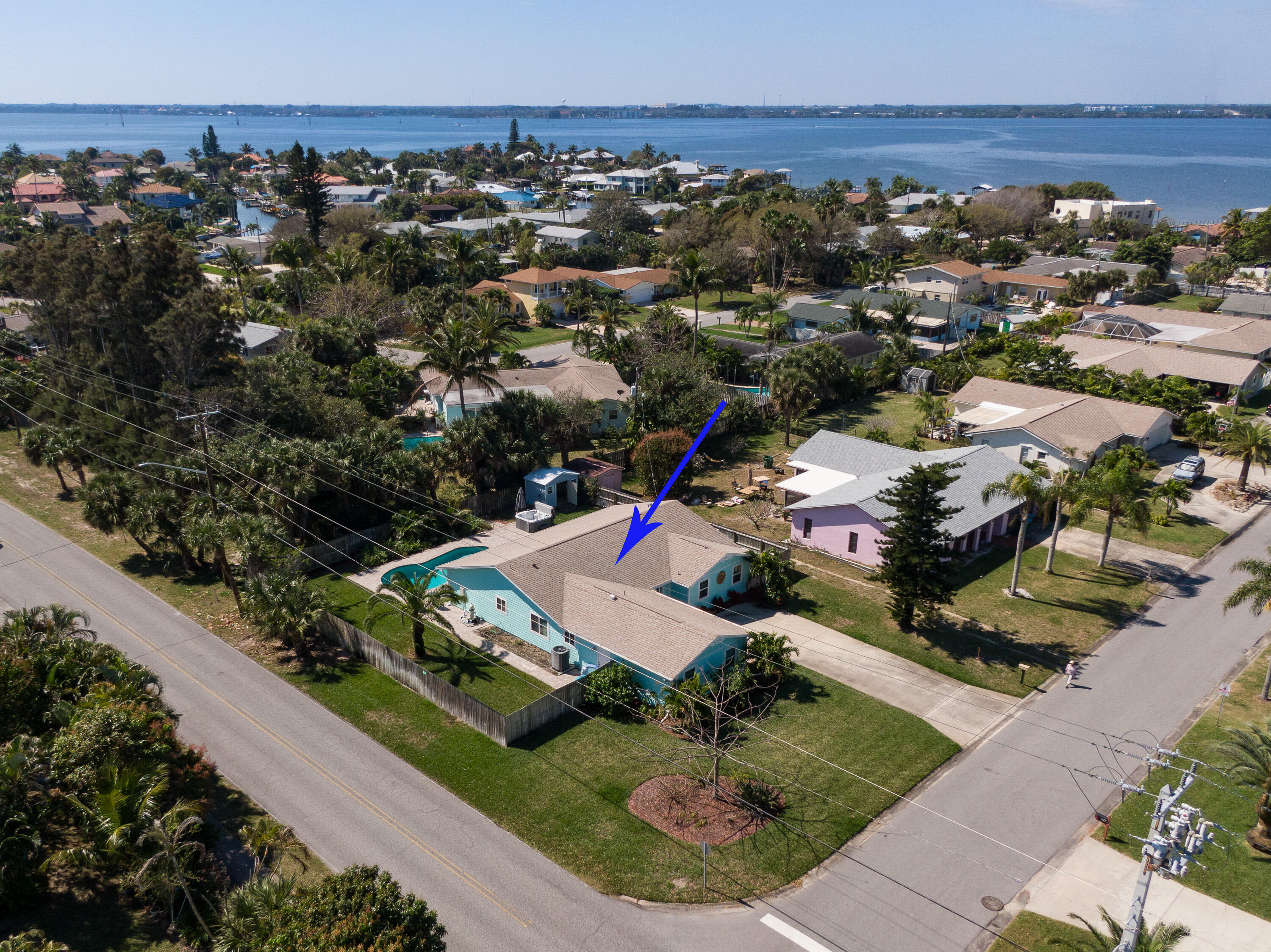 401 Surf Road Melbourne Beach, FL 32951 - Photo 6 of 94 an aerial view of a house with a yard