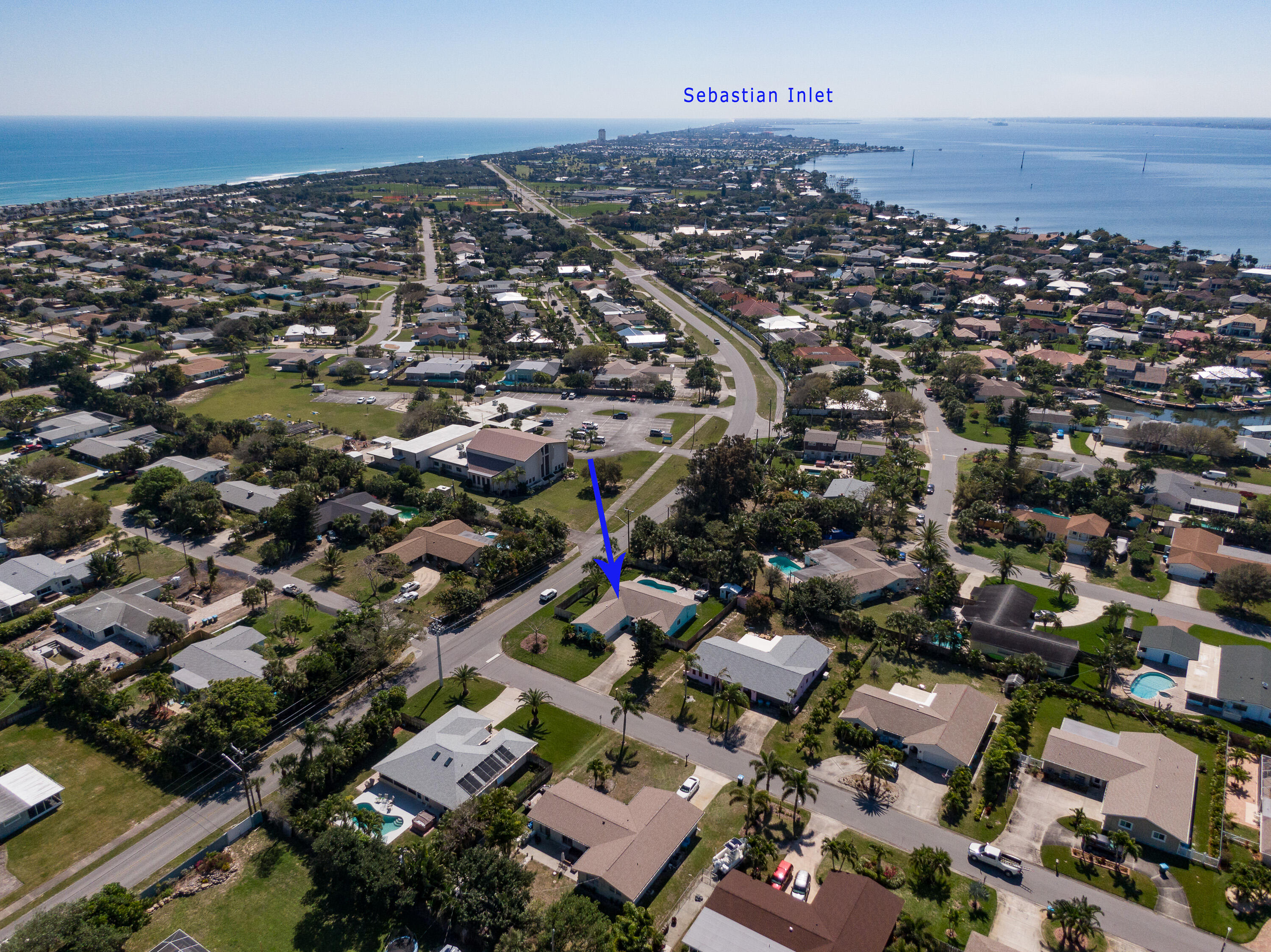 401 Surf Road Melbourne Beach, FL 32951 - Photo 64 of 94 an aerial view of a city with lots of residential buildings