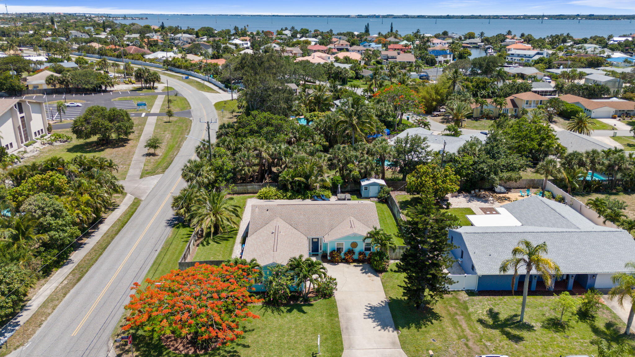 401 Surf Road Melbourne Beach, FL 32951 - Photo 65 of 94 an aerial view of residential houses with outdoor space