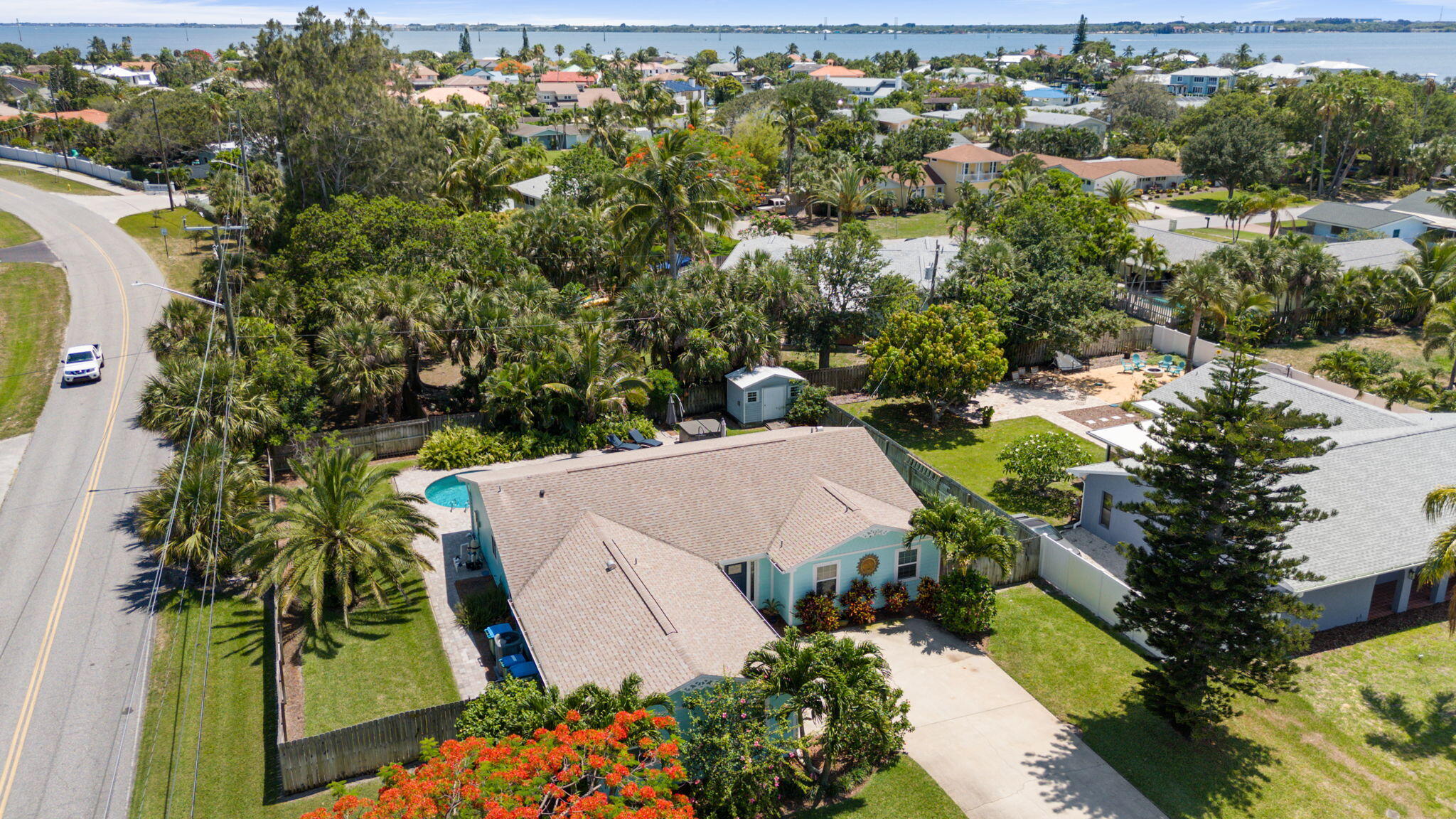 401 Surf Road Melbourne Beach, FL 32951 - Photo 67 of 94 an aerial view of a house with a yard