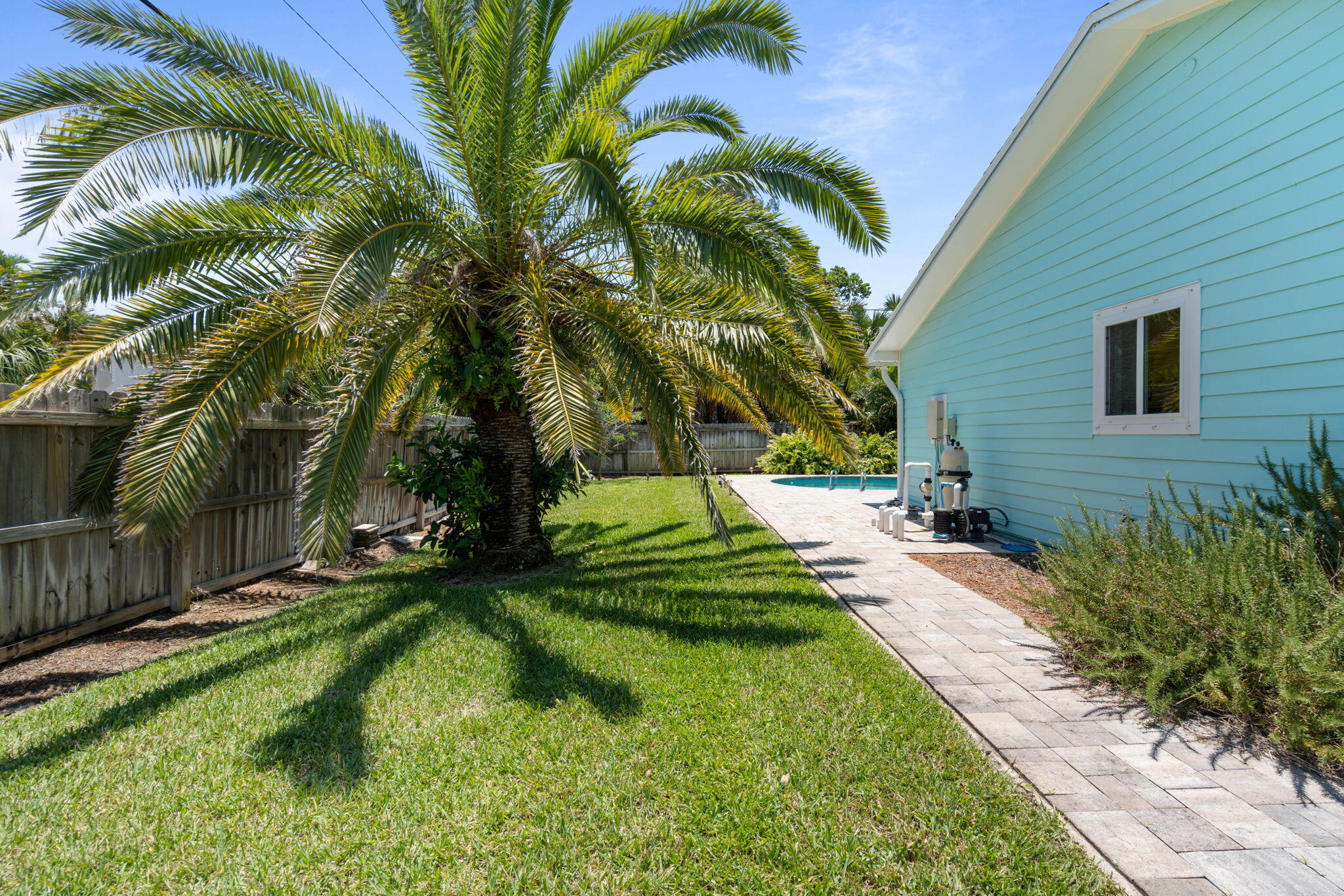 401 Surf Road Melbourne Beach, FL 32951 - Photo 80 of 94 a view of a backyard with plants