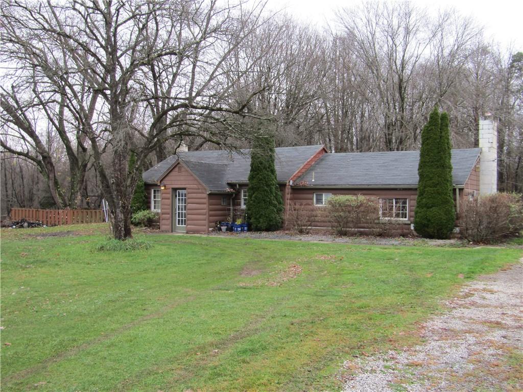 1177 Bend Road Mercer, PA 16137 - Photo 2 of 9 a view of house with backyard and garden