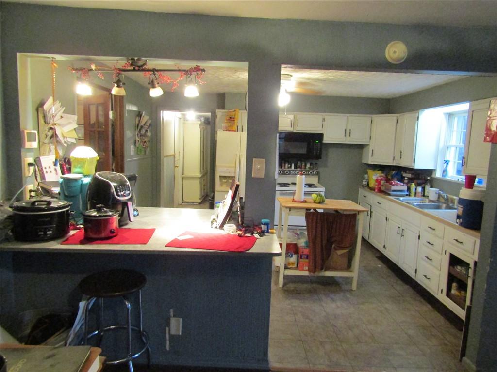 1177 Bend Road Mercer, PA 16137 - Photo 6 of 9 a workspace with furniture and window