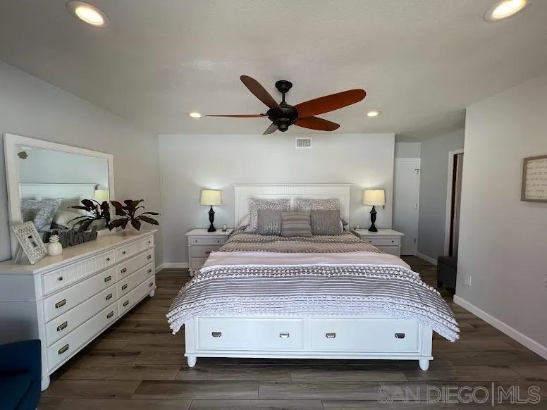 156 Little Oaks Road Encinitas, CA 92024 - Photo 13 of 38 a bedroom with a bed and a dresser