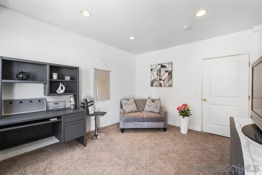 156 Little Oaks Road Encinitas, CA 92024 - Photo 19 of 38 a living room with furniture and kitchen view