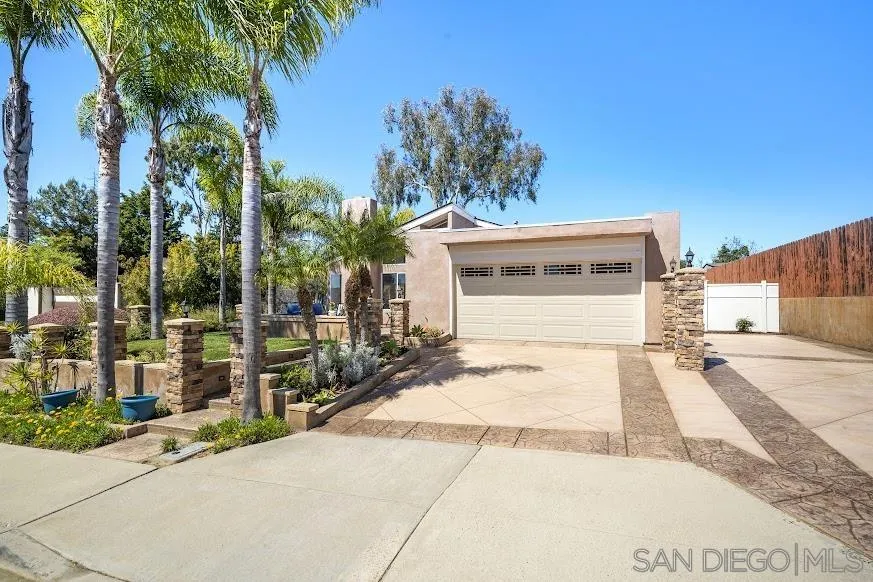 156 Little Oaks Road Encinitas, CA 92024 - Photo 23 of 38 front view of a house with a yard