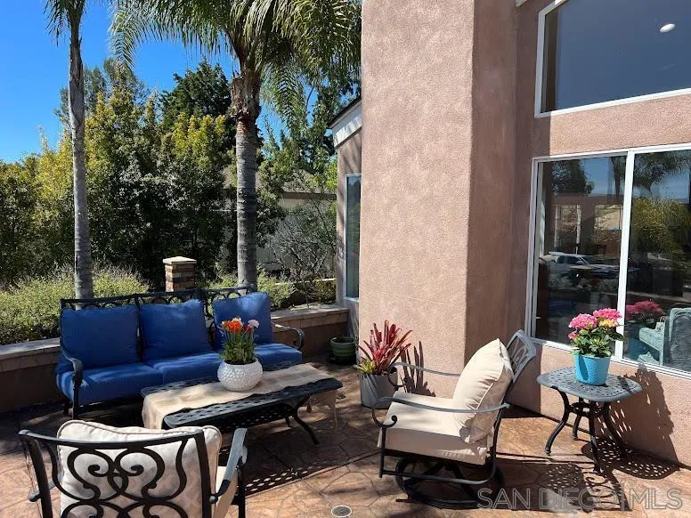 156 Little Oaks Road Encinitas, CA 92024 - Photo 25 of 38 a outdoor living space with furniture and a potted plant