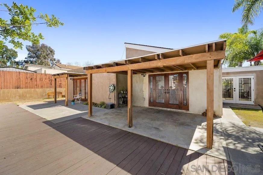 156 Little Oaks Road Encinitas, CA 92024 - Photo 27 of 38 a view of a house with wooden floor and backyard