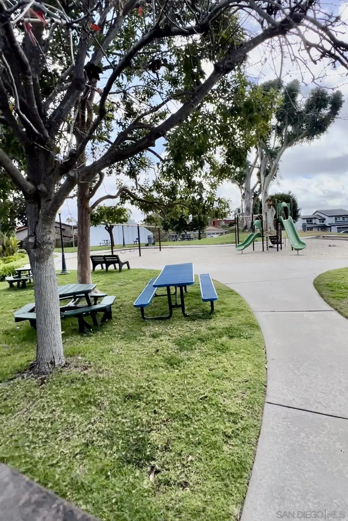 156 Little Oaks Road Encinitas, CA 92024 - Photo 37 of 38 a backyard of a house with table and chairs