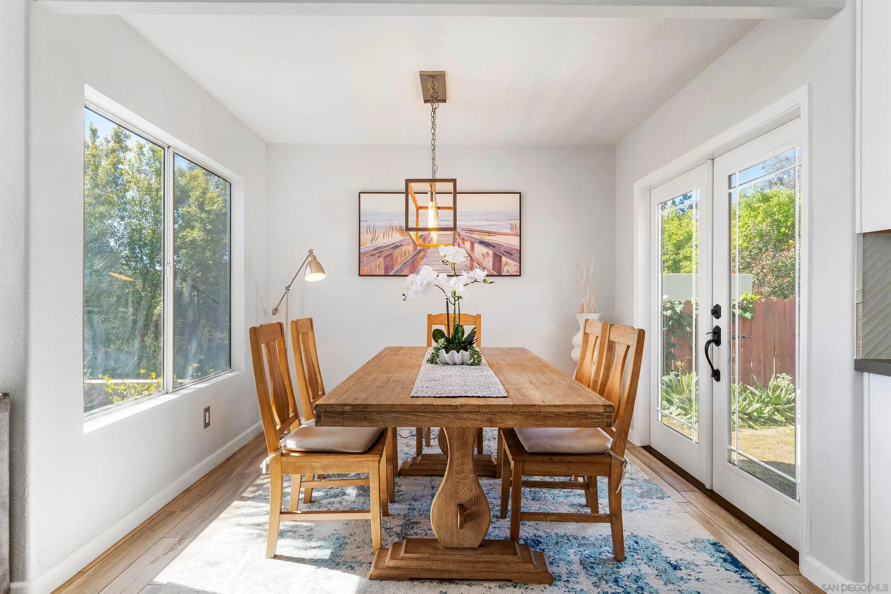 156 Little Oaks Road Encinitas, CA 92024 - Photo 10 of 38 a view of a dining room with furniture window and outside view