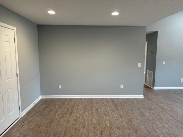1415 Old Estill Springs Road Tullahoma, TN 37388 - Photo 14 of 25 wooden floor in an empty room with a window