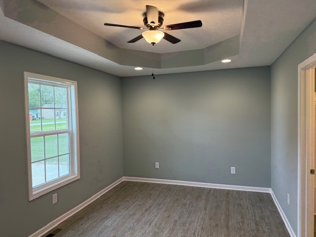 1415 Old Estill Springs Road Tullahoma, TN 37388 - Photo 17 of 25 an empty room with windows and fan