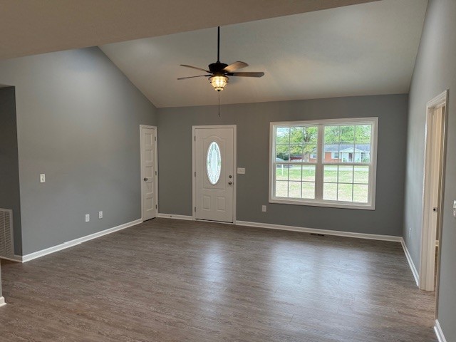 1415 Old Estill Springs Road Tullahoma, TN 37388 - Photo 3 of 25 an empty room with wooden floor chandelier and windows