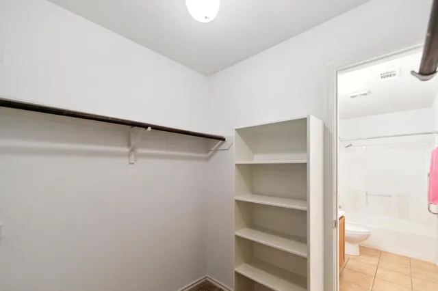 a storage room with cabinets