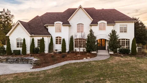 a front view of a house with patio