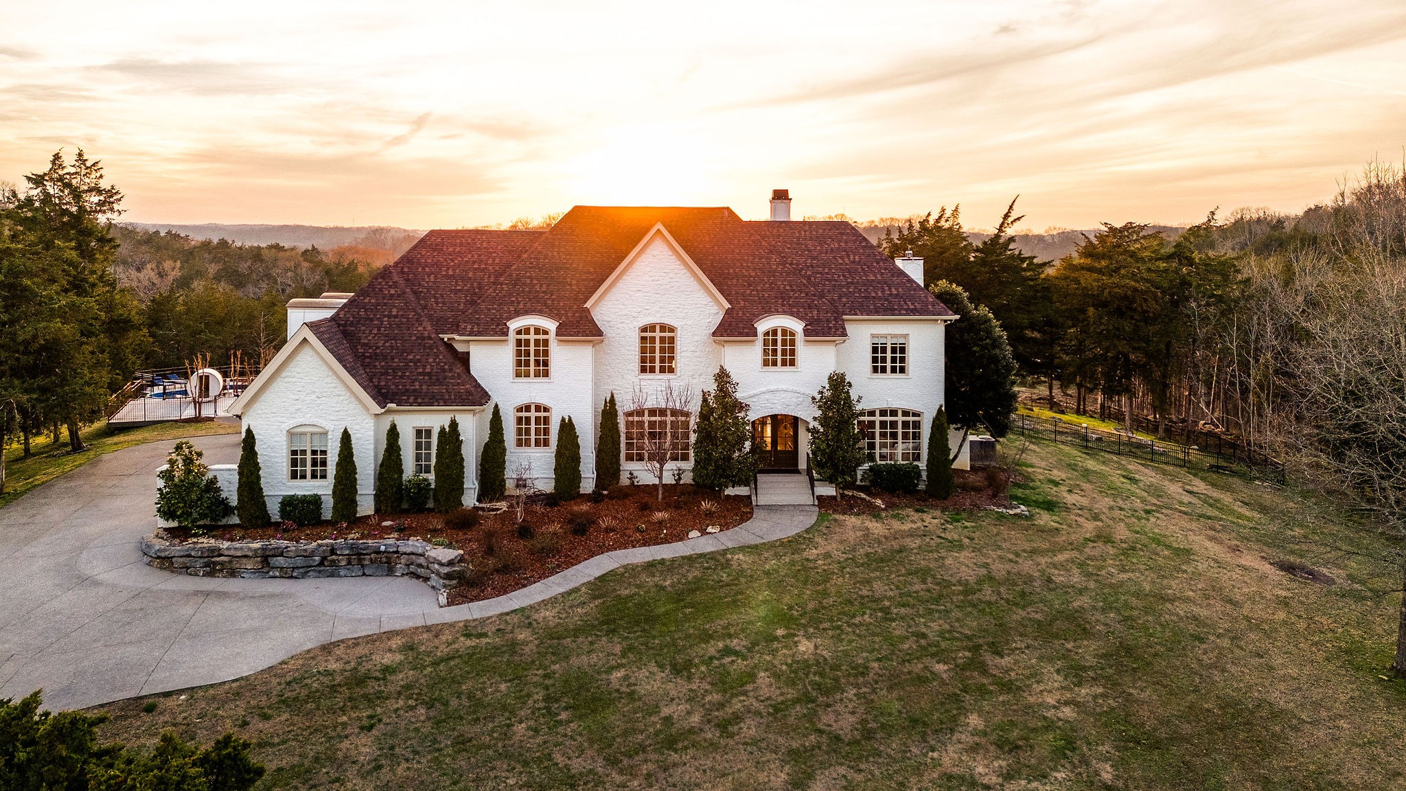 3239 Kinnard Springs Road Franklin, TN 37064 - Photo 22 of 34 a view of a house with backyard and trees
