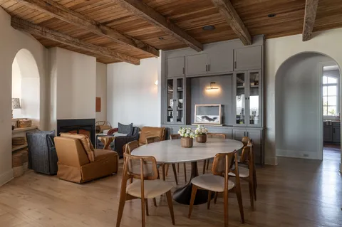 a view of a dining room with furniture