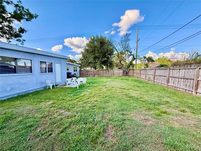 a view of a backyard with a garden