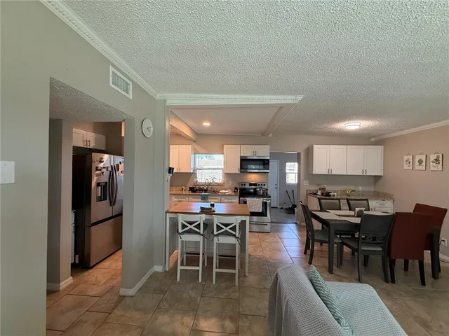 a view of a dining area with furniture