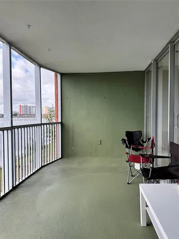 a room with furniture and window