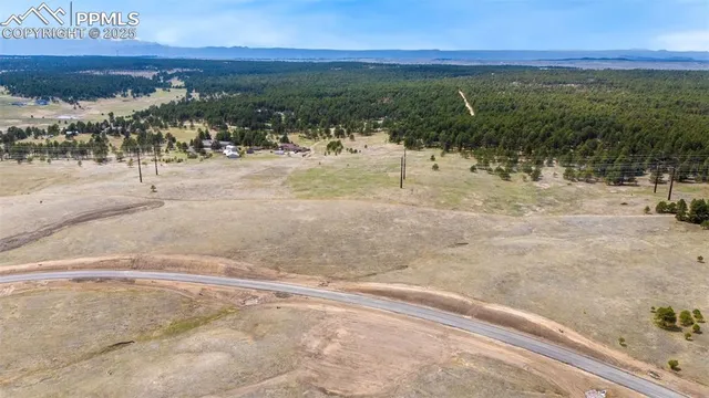 a view of a yard with a ocean view