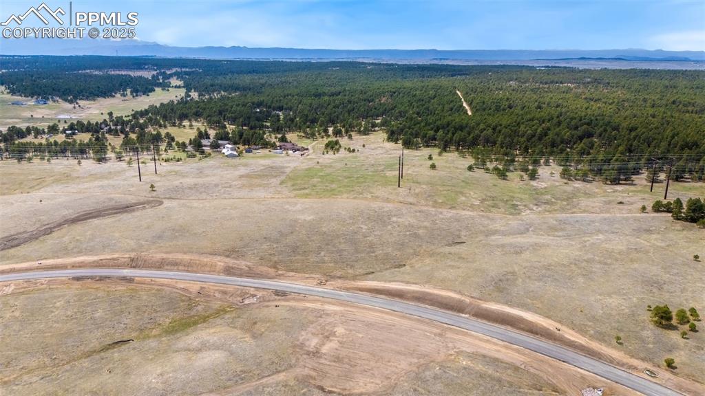 10125 Alamar Way Colorado Springs, CO 80908 - Photo 24 of 29 a view of a yard with a ocean view