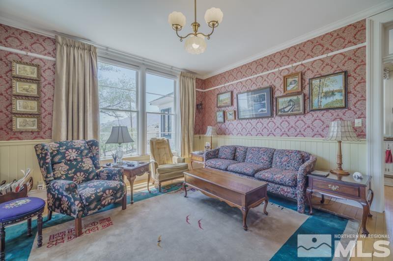 727 Highway 339 Yerington, NV 89447 - Photo 19 of 36 a living room with furniture and a large window