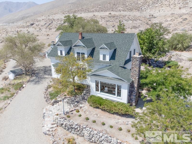 727 Highway 339 Yerington, NV 89447 - Photo 2 of 36 front view of a house with a yard