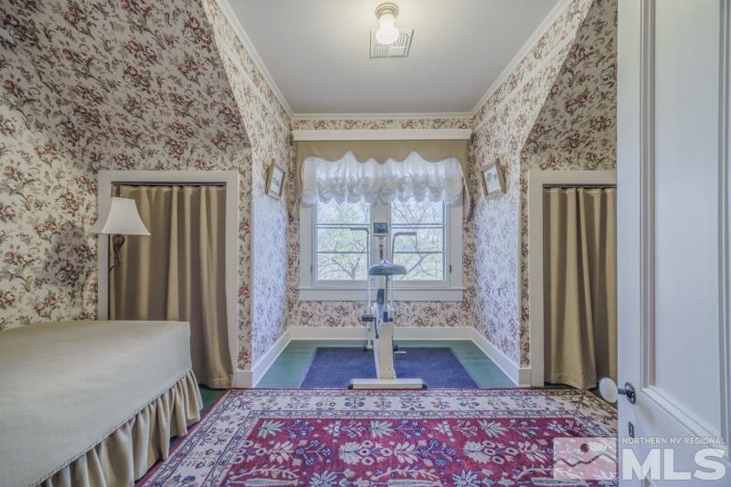 727 Highway 339 Yerington, NV 89447 - Photo 31 of 36 a very nice looking room with wooden floor and a large window