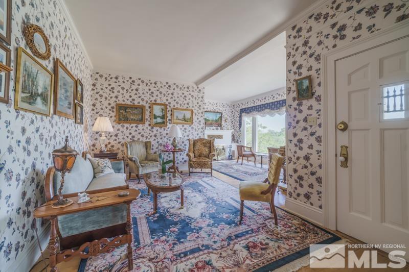 727 Highway 339 Yerington, NV 89447 - Photo 4 of 36 a living room with furniture and a fireplace