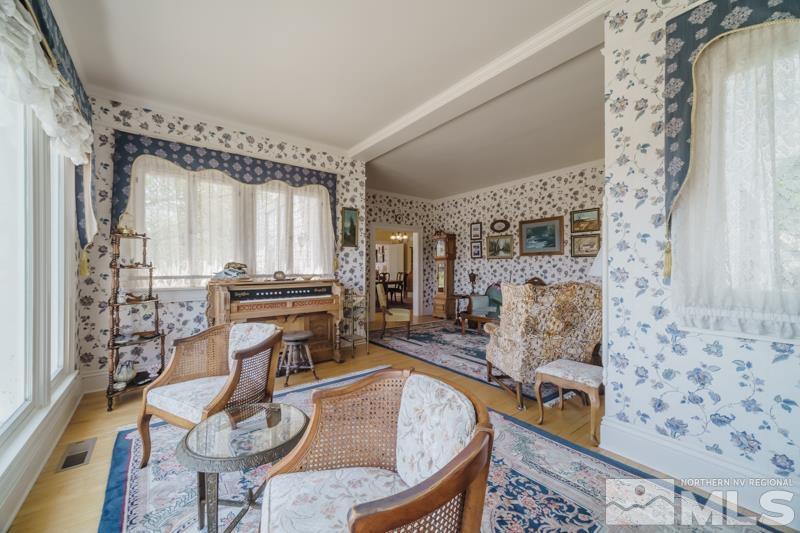 727 Highway 339 Yerington, NV 89447 - Photo 7 of 36 a living room with furniture and a fireplace