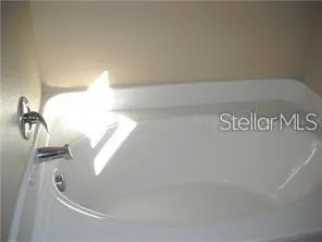a view of a bathtub in bathroom