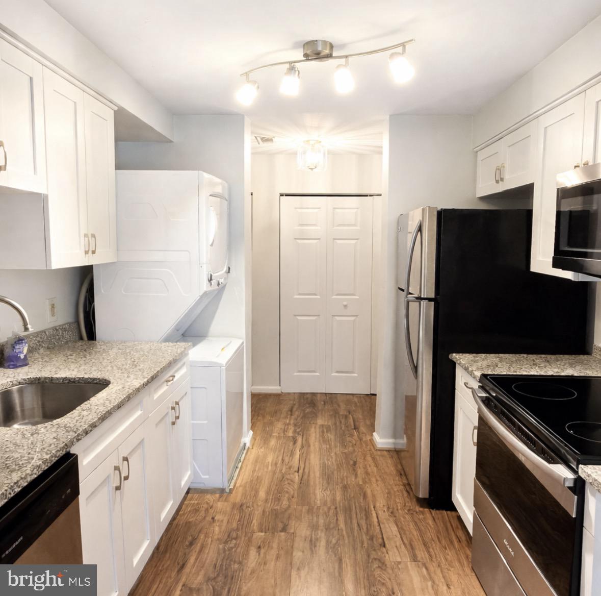 8503 Falls Run Road, Unit B Ellicott City, MD 21043 - Photo 5 of 23 Modern kitchen with sleek finishes.