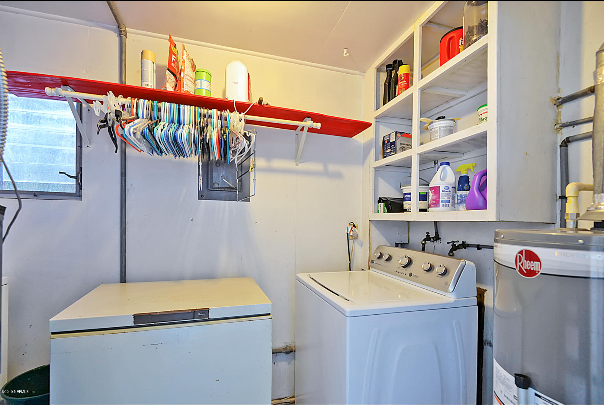 7442 Melvin Road Jacksonville, FL 32210 - Photo 12 of 17 a utility room with dryer and washer