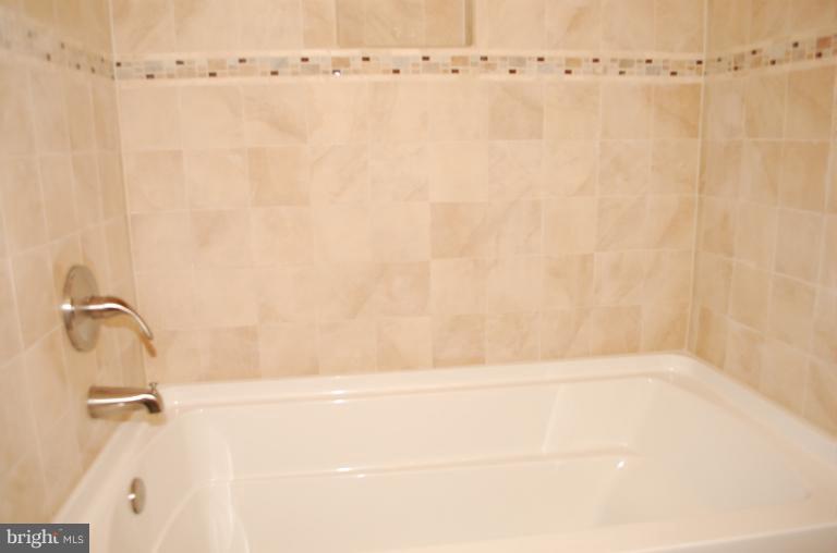 6216 Stevens Forest Road Columbia, MD 21045 - Photo 26 of 30 a bathroom with a shower