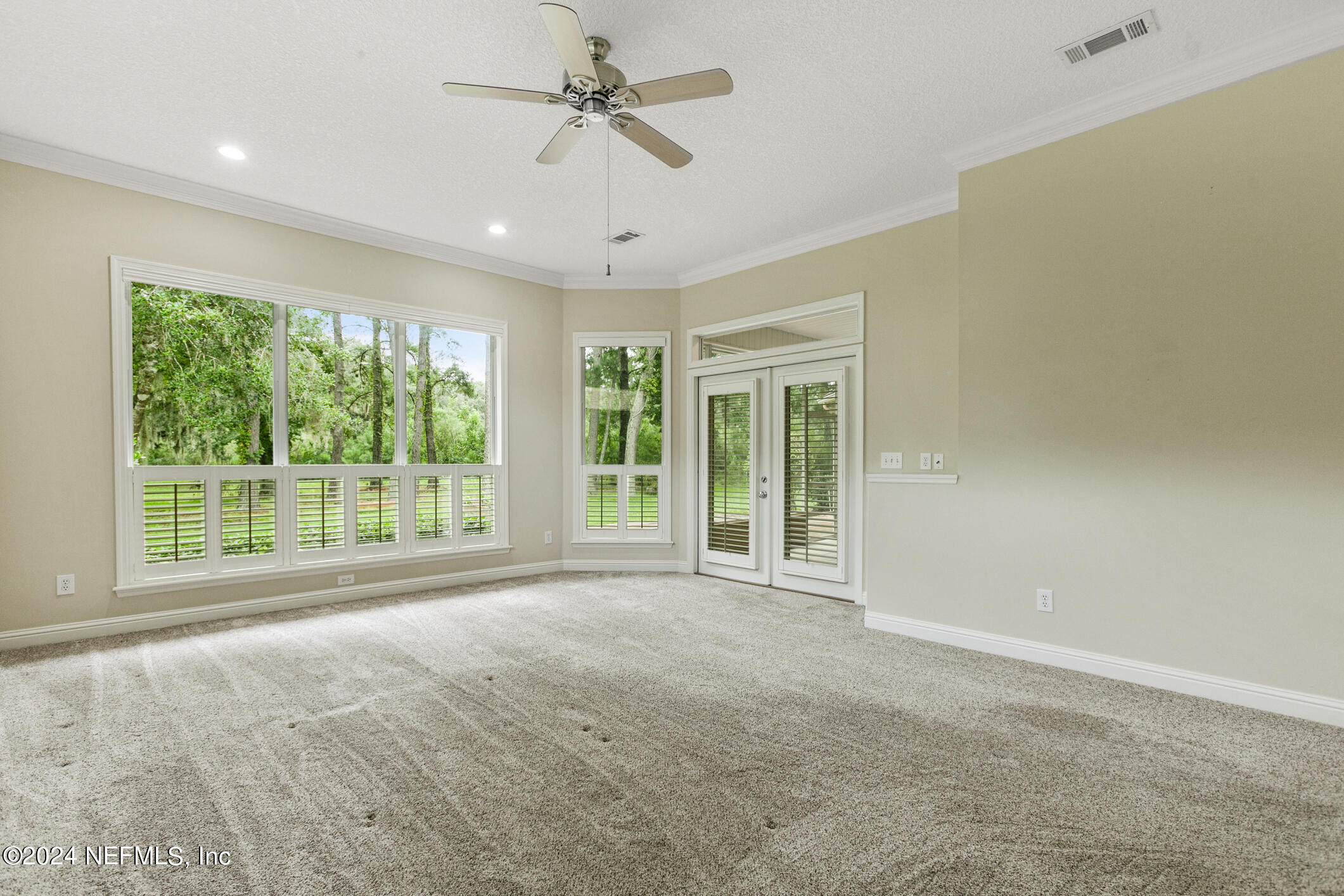 615 Cherry Grove Road Orange Park, FL 32073 - Photo 34 of 66 Downstairs Primary Bedroom