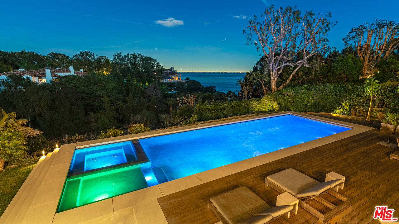 28827 Grayfox Street Malibu, CA 90265 - Photo 2 of 60 a view of swimming pool with a yard
