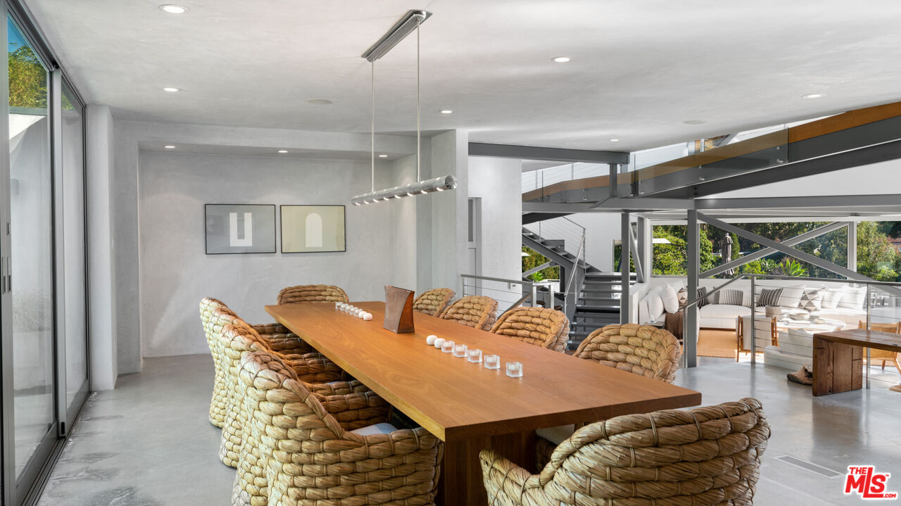28827 Grayfox Street Malibu, CA 90265 - Photo 24 of 60 a view of a livingroom with furniture and a dining table