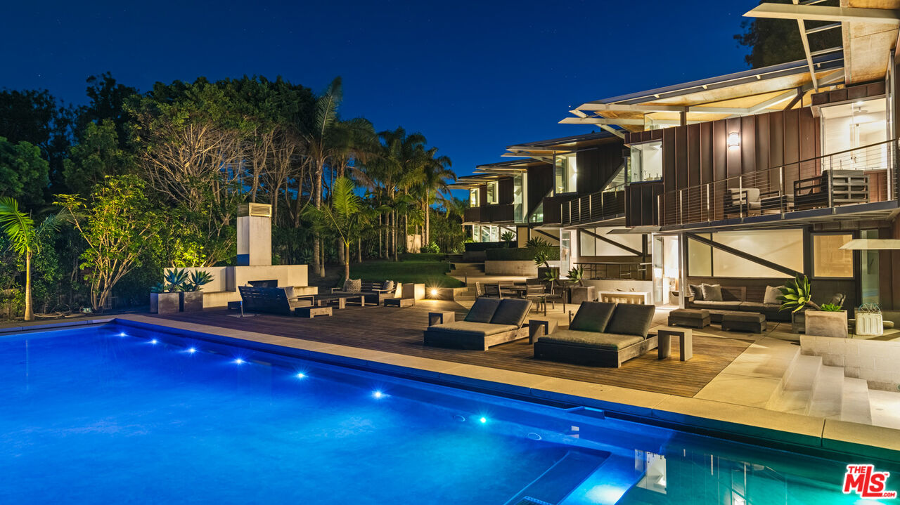 28827 Grayfox Street Malibu, CA 90265 - Photo 60 of 60 a view of a swimming pool with a patio