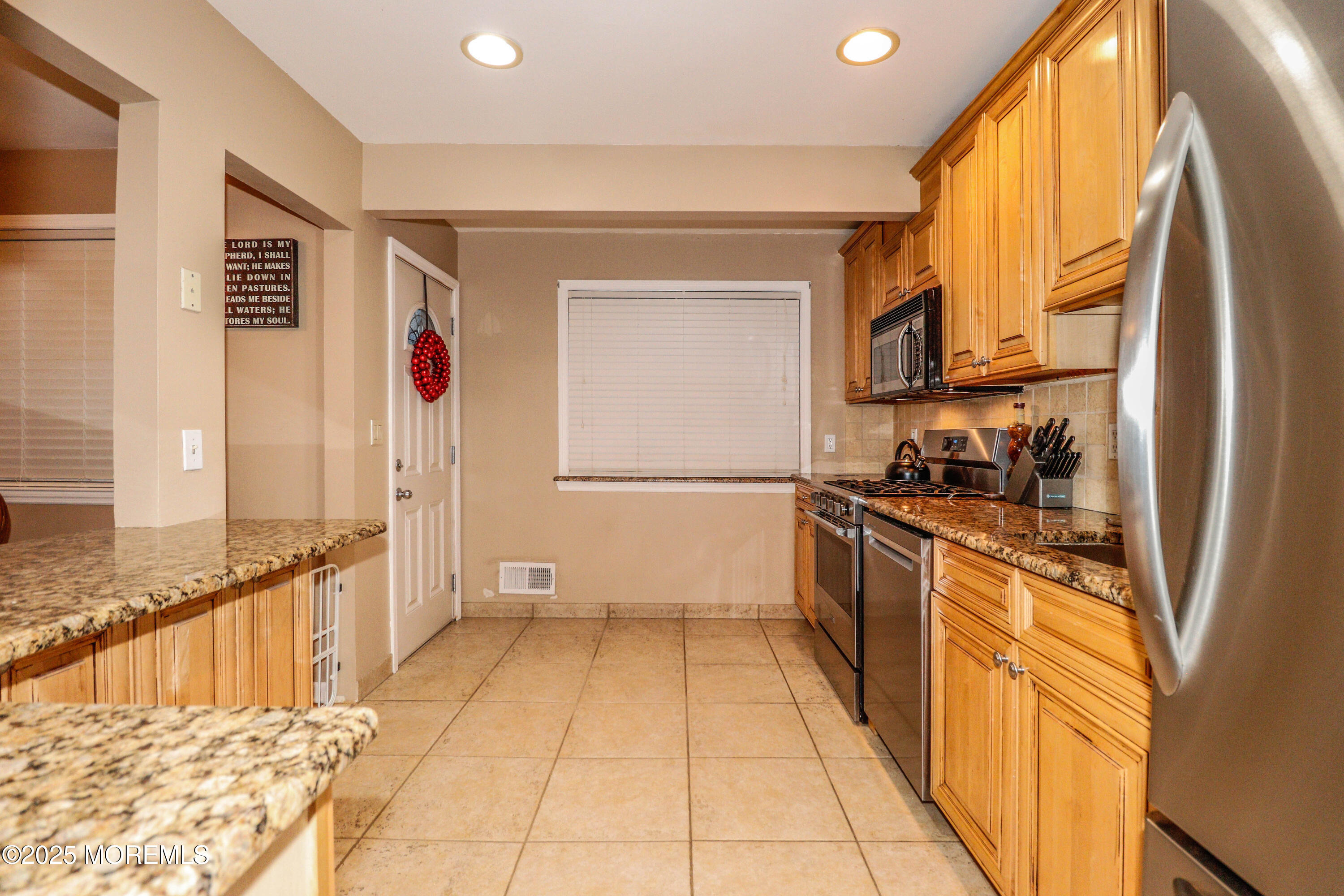 7 Alan Terrace Jackson, NJ 08527 - Photo 12 of 28 a kitchen with stainless steel appliances granite countertop a refrigerator and a sink