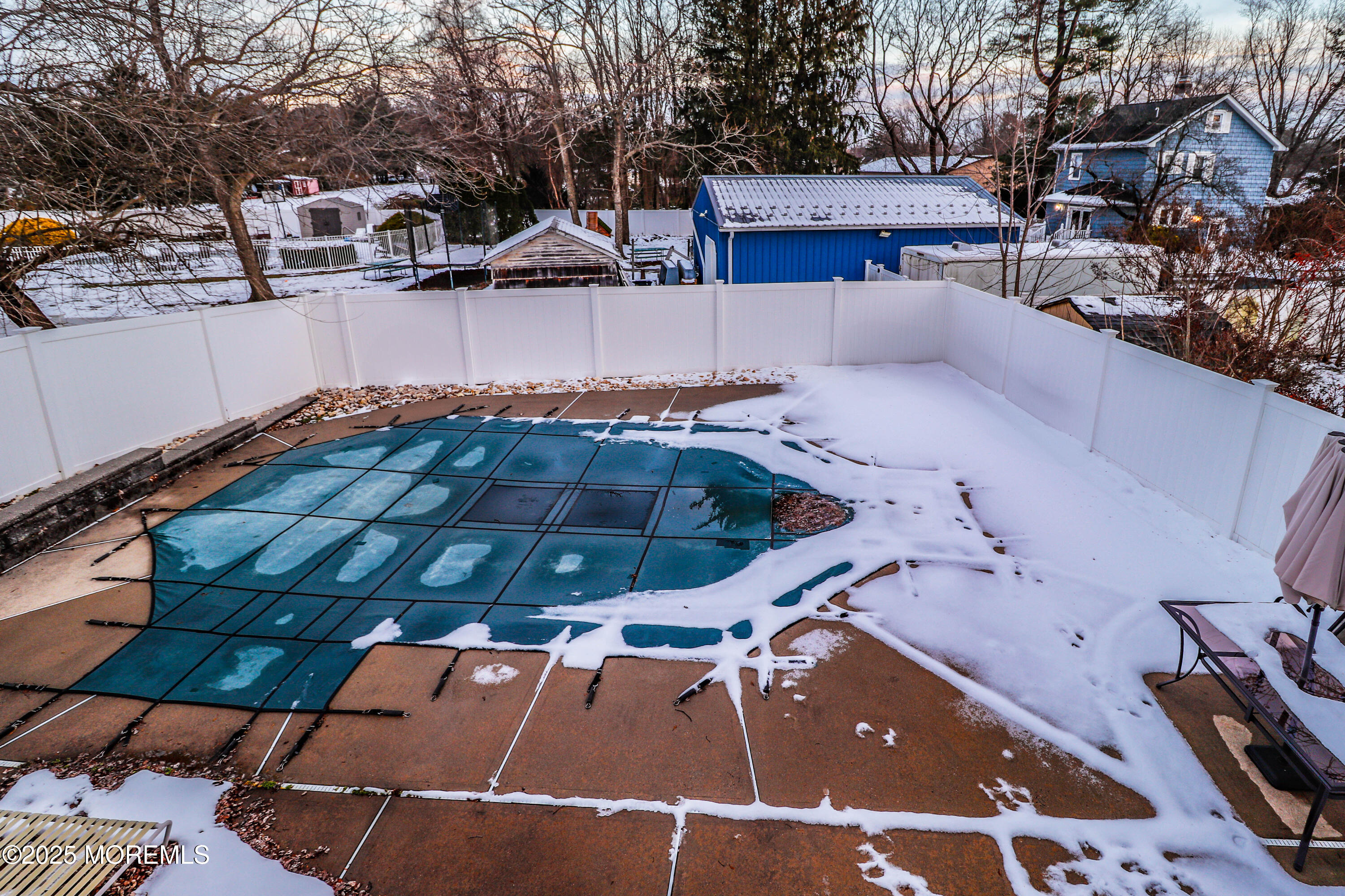 7 Alan Terrace Jackson, NJ 08527 - Photo 26 of 28 a roof view covered with wooden fence