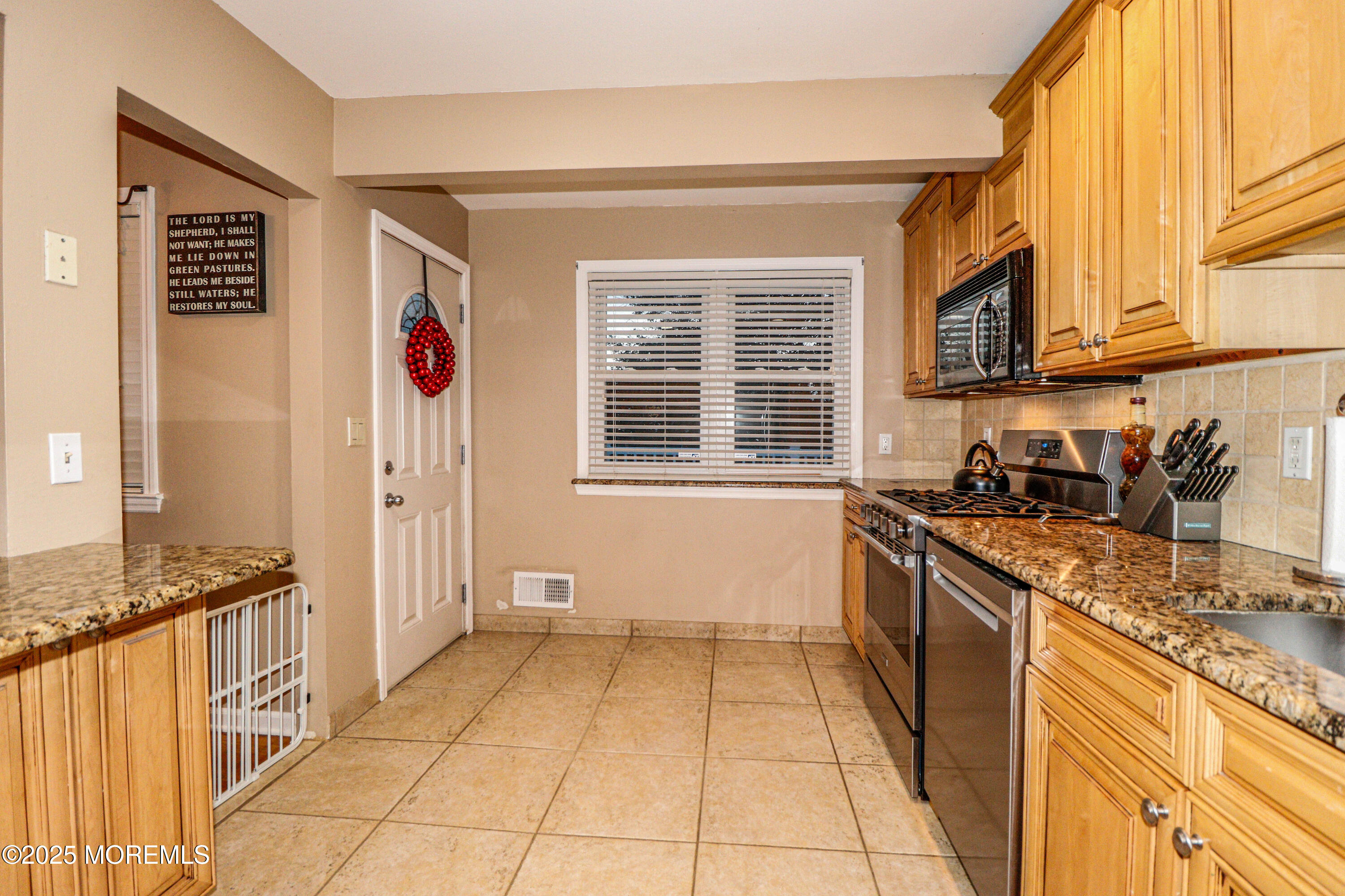 7 Alan Terrace Jackson, NJ 08527 - Photo 6 of 28 a kitchen with stainless steel appliances granite countertop a refrigerator and a stove top oven
