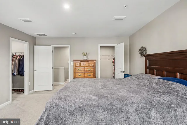 a big room with closet and cabinet