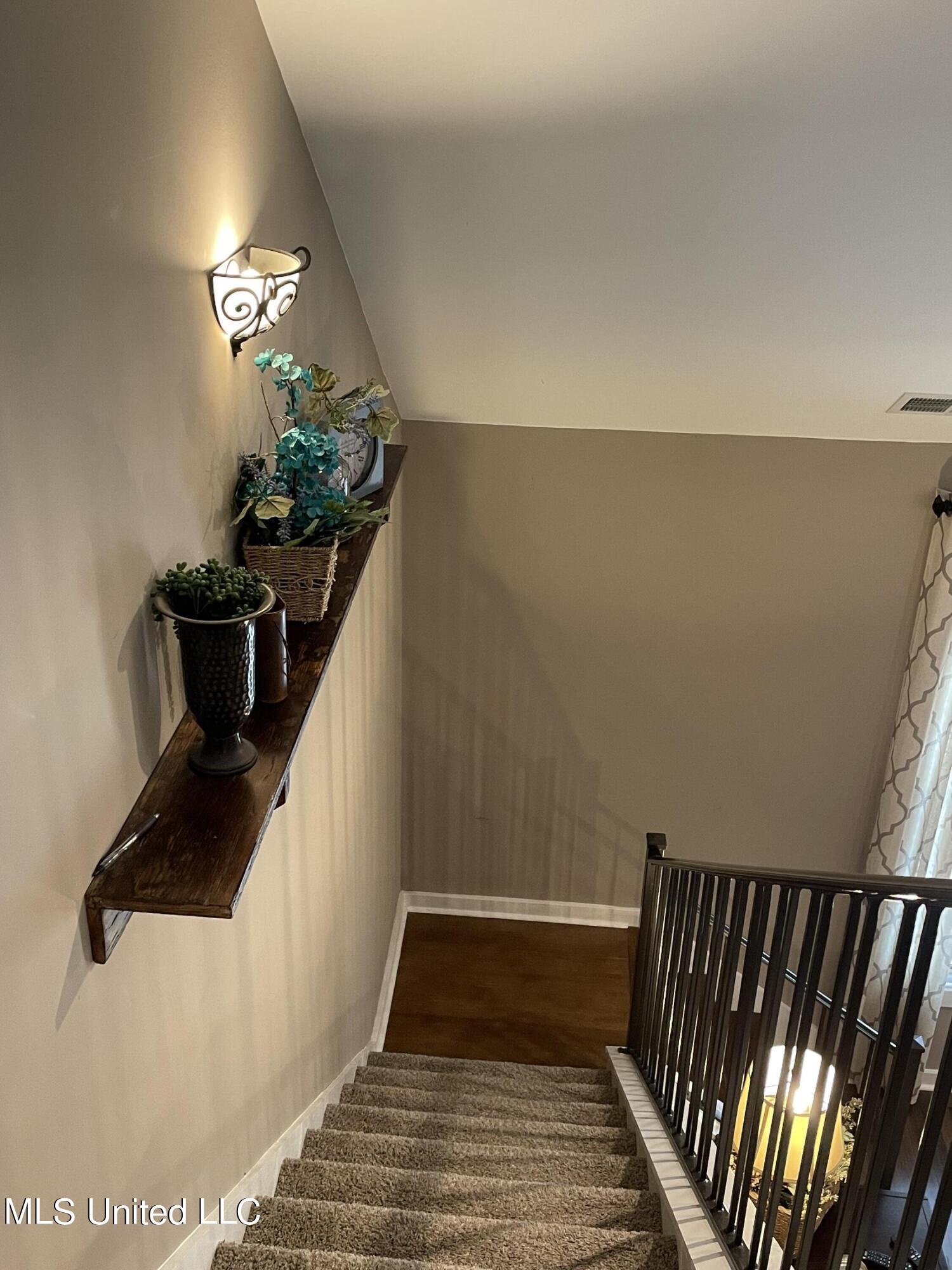 1062 Taska Road Red Banks, MS 38661 - Photo 8 of 24 View Down stairs from Upstairs