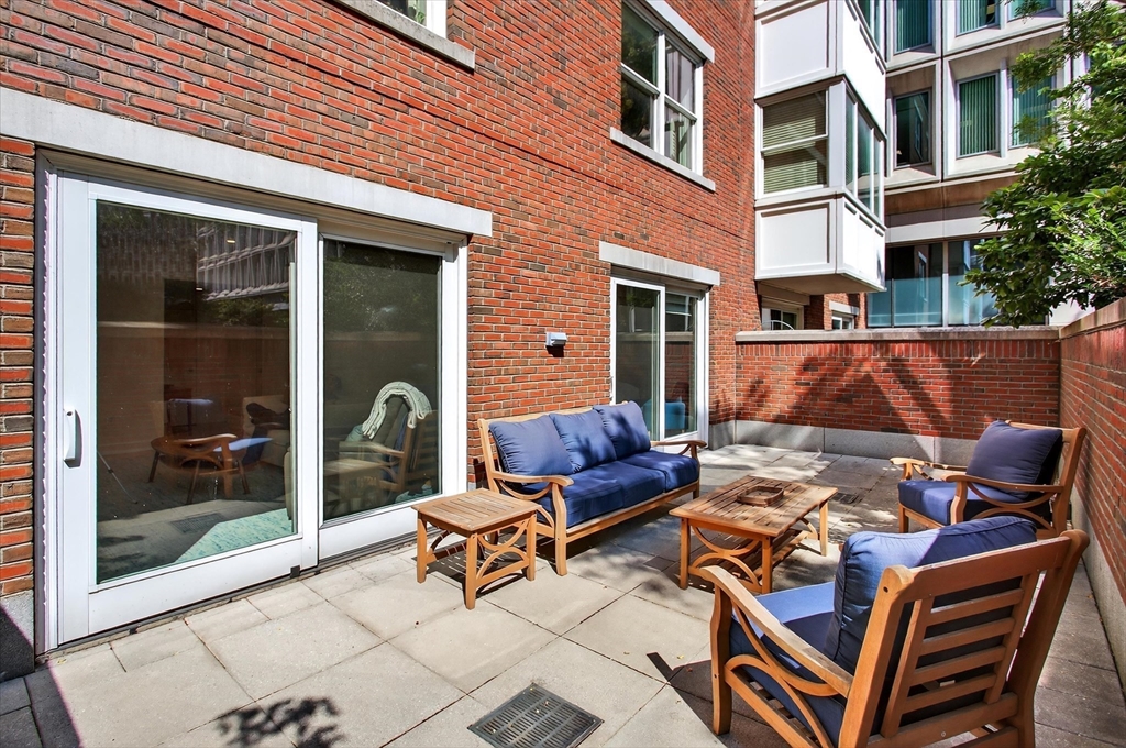 10 Bowdoin Street, Unit 202 Boston, MA 02114 - Photo 6 of 16 a outdoor space with a barbeque