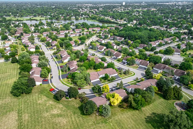 an aerial view of residential house with outdoor space